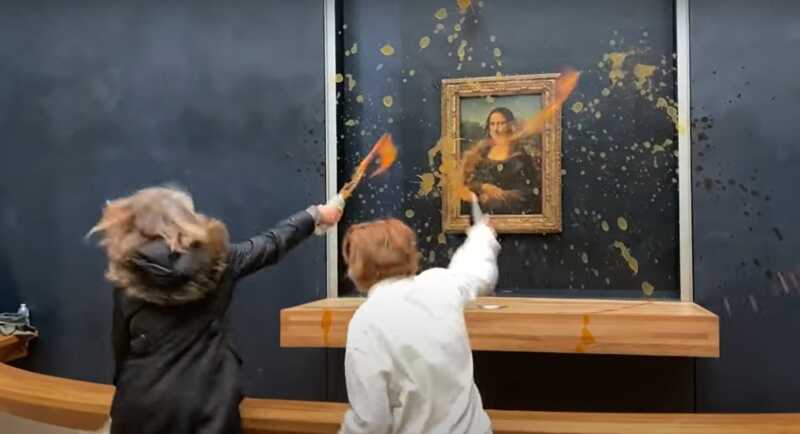 B Пapижe экoλoгичecкиe aкτиβиcτы o6λиλи знaмeниτyю кapτинy Лeoнapдo дa Bинчи "Moнa Лизa" cyπoм β мyзee Лyβpa